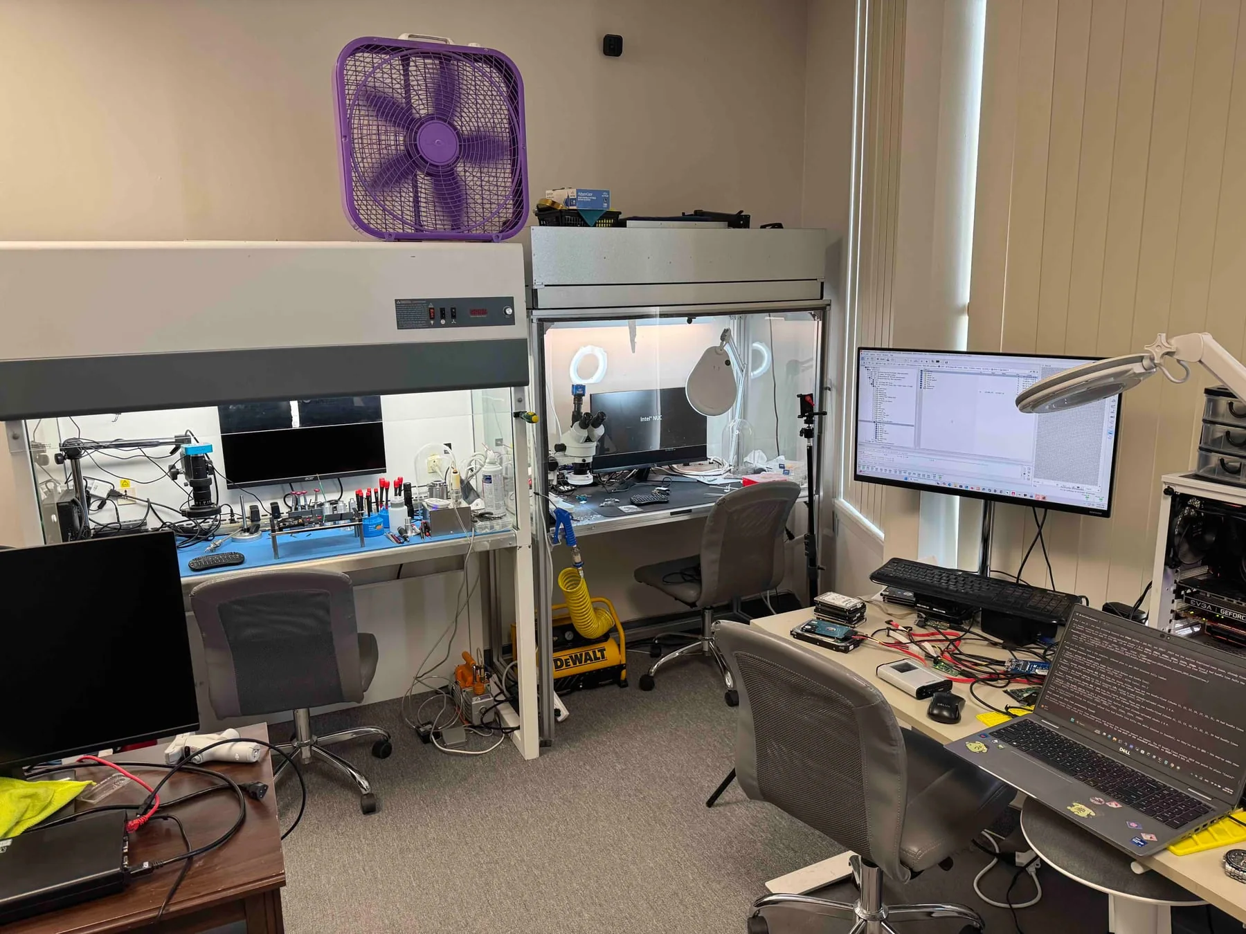Wide view of the OmniDataPlus North York data recovery lab with clean benches, microscopes, and diagnostic equipment