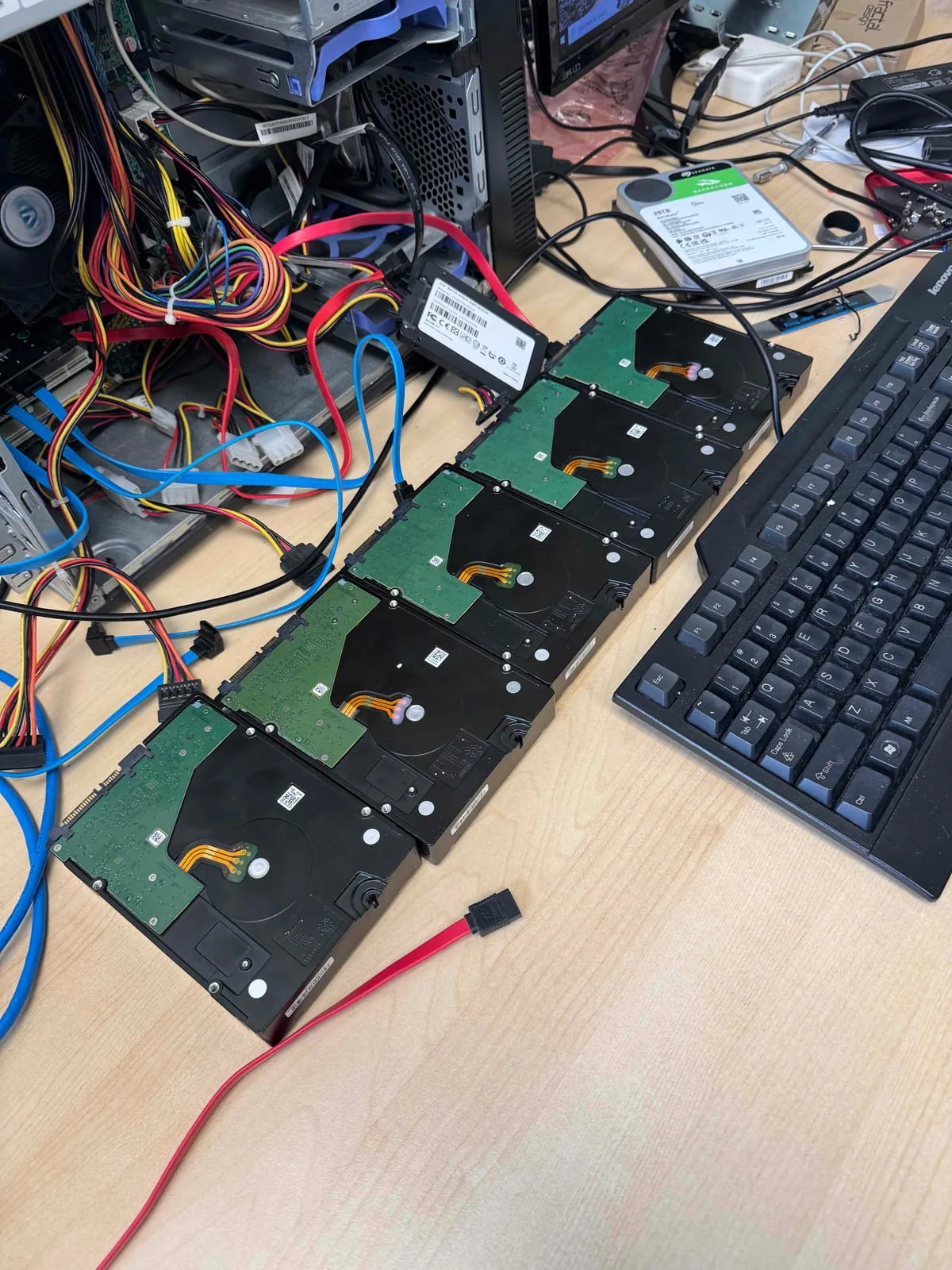 RAID hard drives connected for controlled imaging before array reconstruction